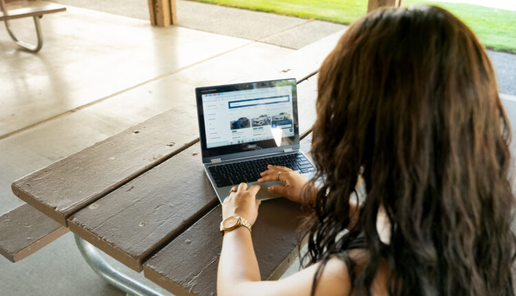 Comparison of a Washington car dealership and Carvana online purchase